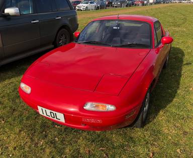 UK Number Plate 1 LOL on a 1991 RED Mazda Mx-5