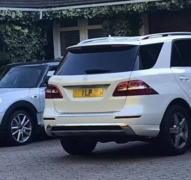 UK Number Plate 1 LP on a 2013 White Mercedes-Benz ML