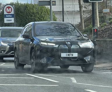 UK Number Plate 1 MFN on a 2022 Black BMW Ix Xdrive40 M Sport Edition