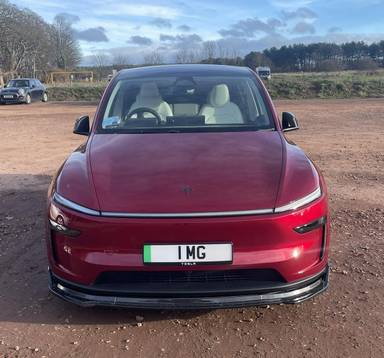 UK Number Plate 1 MG on a 2025 RED Tesla Model Y Long Range Rwd