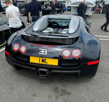 UK Number Plate 1 ML on a 2012 Black Bugatti Veyron