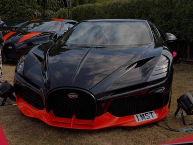 UK Number Plate 1 MST on a 2025 Black Bugatti