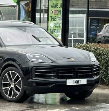 UK Number Plate 1 MWT on a 2024 Black Porsche Cayenne