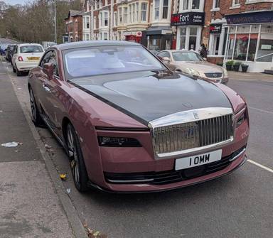 UK Number Plate 1 OMM on a 2023 Pink Rolls Royce Spectre Ev