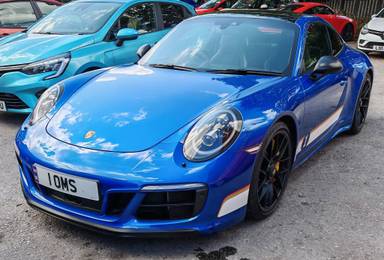 UK Number Plate 1 OMS on a 2018 Blue Porsche 911