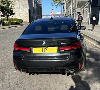 UK Number Plate 1 P on a 2022 Black BMW 5 Series