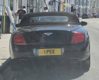 UK Number Plate 1 PEE on a 2010 Black Bentley Continental
