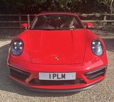 UK Number Plate 1 PLM on a 2023 RED Porsche 911 Carrera 4 Gts S-A
