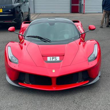 UK Number Plate 1 PS on a 2016 RED Ferrari Laferrari