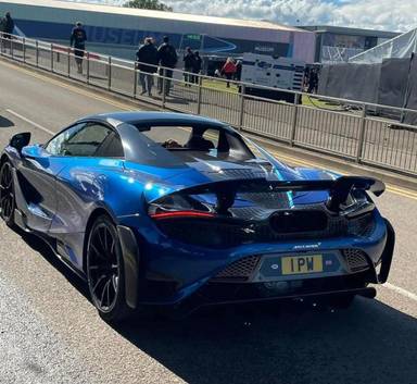 UK Number Plate 1 PW on a 2022 Blue Mclaren