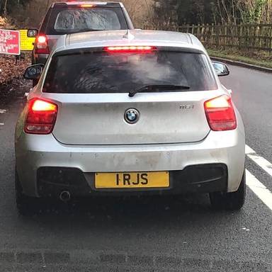UK Number Plate 1 RJS on a 2014 Silver BMW 116