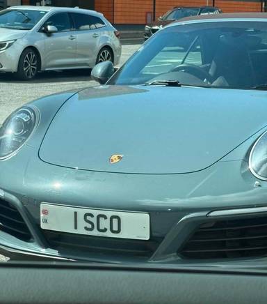 UK Number Plate 1 SCO on a 2016 Blue Porsche DBS