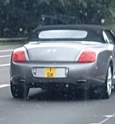 UK Number Plate 1 SK on a 2007 Silver Bentley Continental
