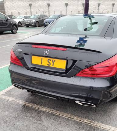 UK Number Plate 1 SY on a 2017 Black Mercedes-Benz SL
