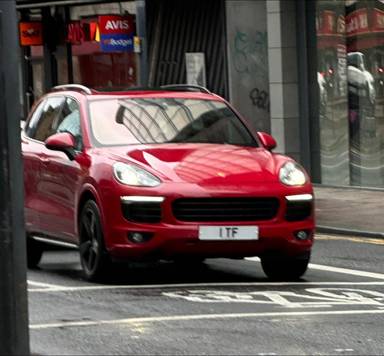 UK Number Plate 1 TF on a 2024 RED Porsche Cayenne