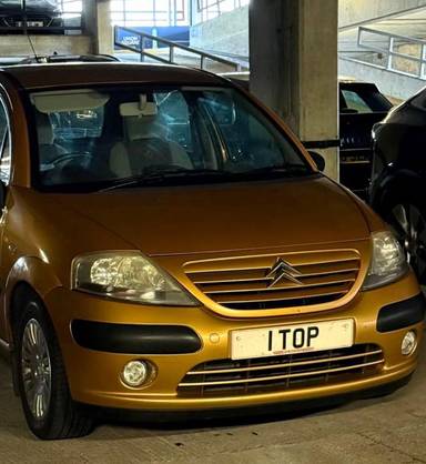 UK Number Plate 1 TOP on a 2002 Gold Citroen C3