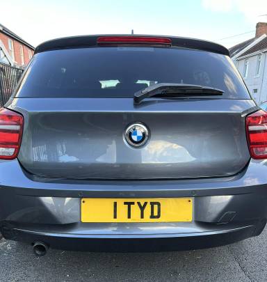 UK Number Plate 1 TYD on a 2012 Grey BMW 1 Series