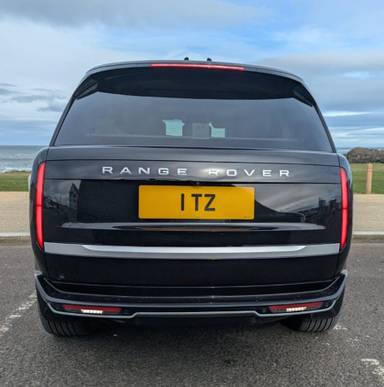 UK Number Plate 1 TZ on a 2026 Black Land Rover