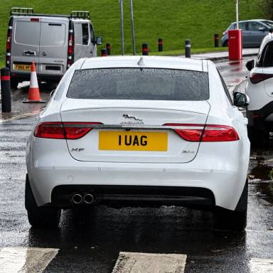 UK Number Plate 1 UAG on a 2017 White Jaguar XF