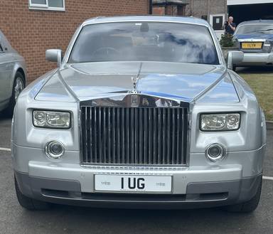 UK Number Plate 1 UG on a 2006 Silver Rolls Royce Phantom