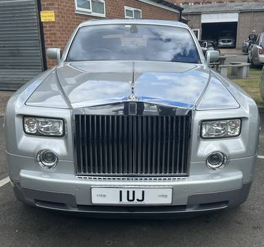 UK Number Plate 1 UJ on a 2007 Grey Rolls Royce Phantom