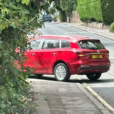 UK Number Plate 1 UNO on a 2022 RED MG 5 Exclusive