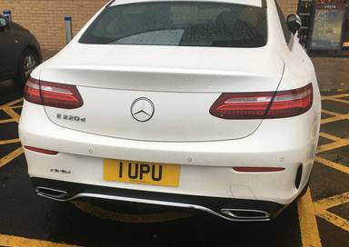 UK Number Plate 1 UPU on a 2017 White Mercedes-Benz E