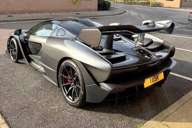 UK Number Plate 1 USK on a 2019 Grey Mclaren Senna V8 S-A