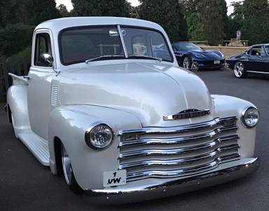 UK Number Plate 1 UW on a 1950 White Chevrolet