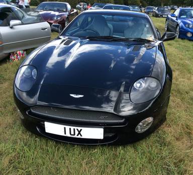 UK Number Plate 1 UX on a 2004 Black Aston Martin DB7