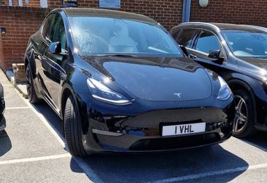 UK Number Plate 1 VHL on a 2022 Black Tesla Model Y Long Range Awd