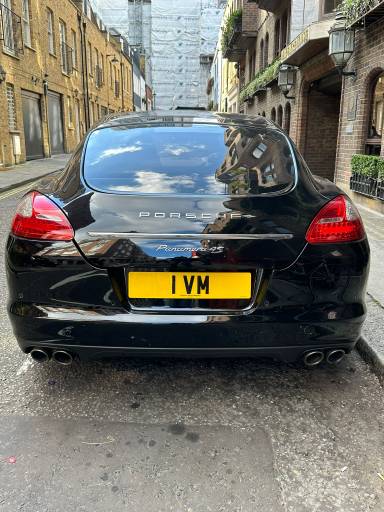 UK Number Plate 1 VM on a 2009 Black Porsche Panamera