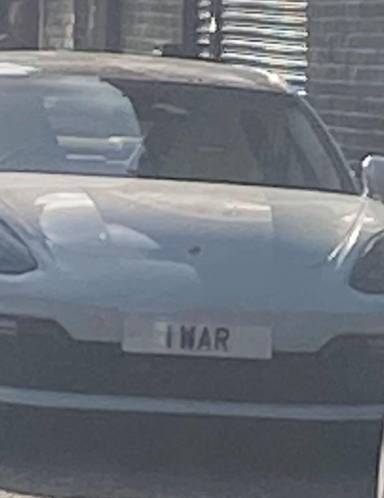 UK Number Plate 1 WAR on a 2017 White Porsche Panamera