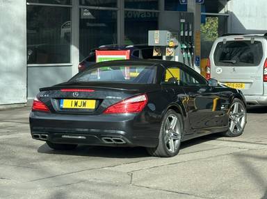 UK Number Plate 1 WJW on a 2013 Black Mercedes-Benz SL