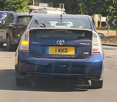 UK Number Plate 1 WKD on a 2010 Blue Toyota Prius
