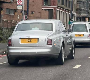 UK Number Plate 1 XE on a 2003 Silver Rolls Royce