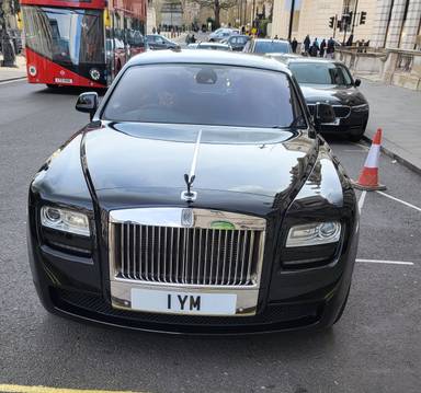 UK Number Plate 1 YM on a 2009 Black Rolls Royce Ghost