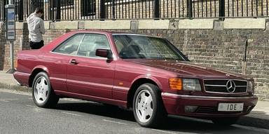 UK Number Plate 10 E on a 1992 RED Mercedes S-Class