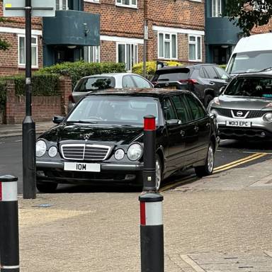 UK Number Plate 10 M on a 2001 Black Mercedes E240 E