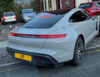 UK Number Plate 11 F on a 2023 Grey Porsche Taycan 4x2
