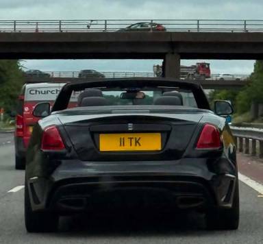 UK Number Plate 11 TK on a 2019 Black Rolls Royce Dawn V12 Black Badge Auto