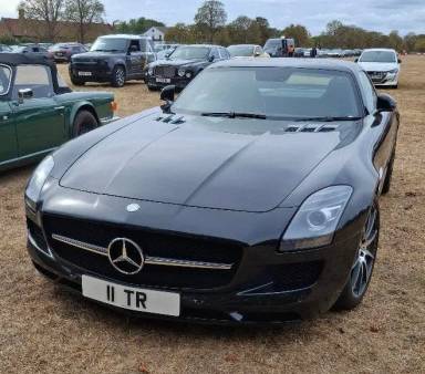 UK Number Plate 11 TR on a 2010 Black Mercedes-Benz SLS