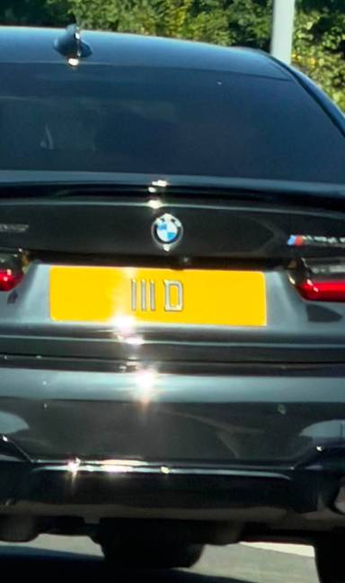 UK Number Plate 111 D on a 2022 Black BMW M340d Xdrive Mhev Auto