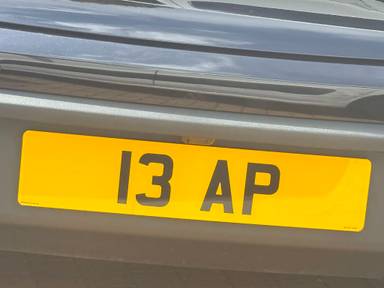 UK Number Plate 13 AP on a 2022 Black Porsche Macan