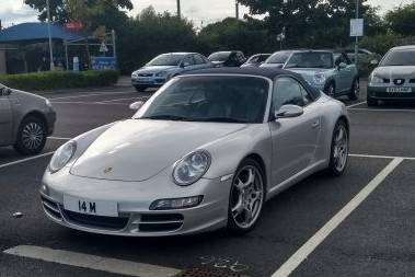 UK Number Plate 14 M on a 2006 Silver Porsche