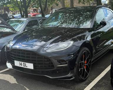 UK Number Plate 14 OL on a 2025 Black Aston Martin Dbx V8 Auto