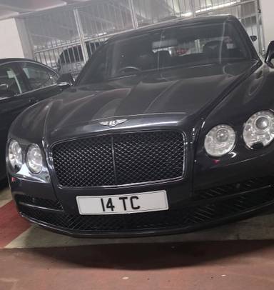 UK Number Plate 14 TC on a 2015 Black Bentley Flying Spur
