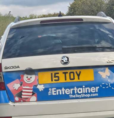 UK Number Plate 15 TOY on a 2018 White Skoda Octavia