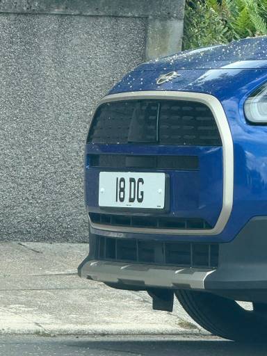 UK Number Plate 18 DG on a 2024 Blue Mini Countryman Exclusive Electric