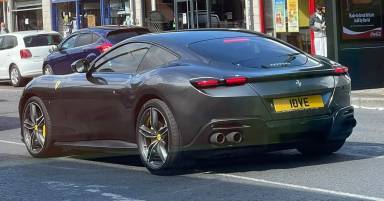 UK Number Plate 18 VE on a 2023 Grey Ferrari Roma S-A